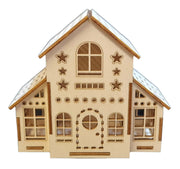 A miniature wooden Christmas house model, complete with windows and a door, highlighting intricate design and craftsmanship.