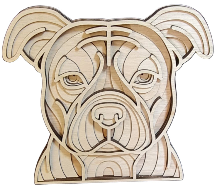 A wooden Staffordshire Bull Terrierdog head featuring a unique pattern of lines, showcasing craftsmanship and artistic design.