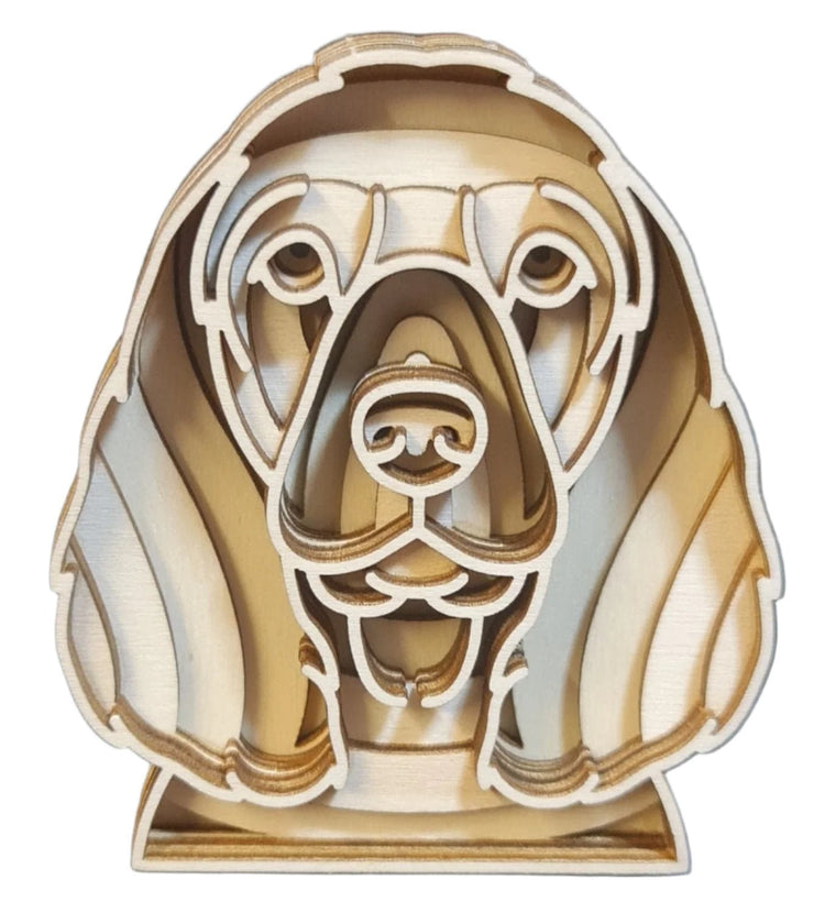 Wooden ornament of a dog head, crafted in the shape of a Working Spaniel, showcasing intricate details and craftsmanship.